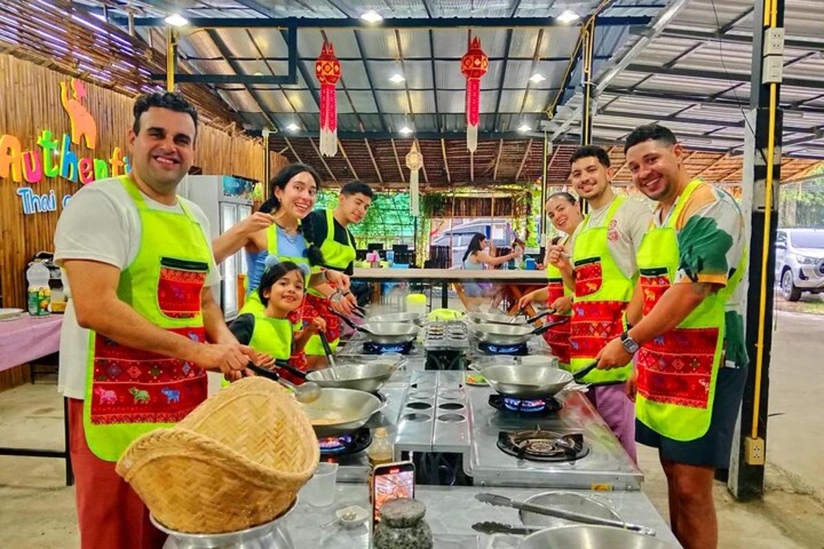 un gruppo di persone con i gilet gialli che preparano il cibo