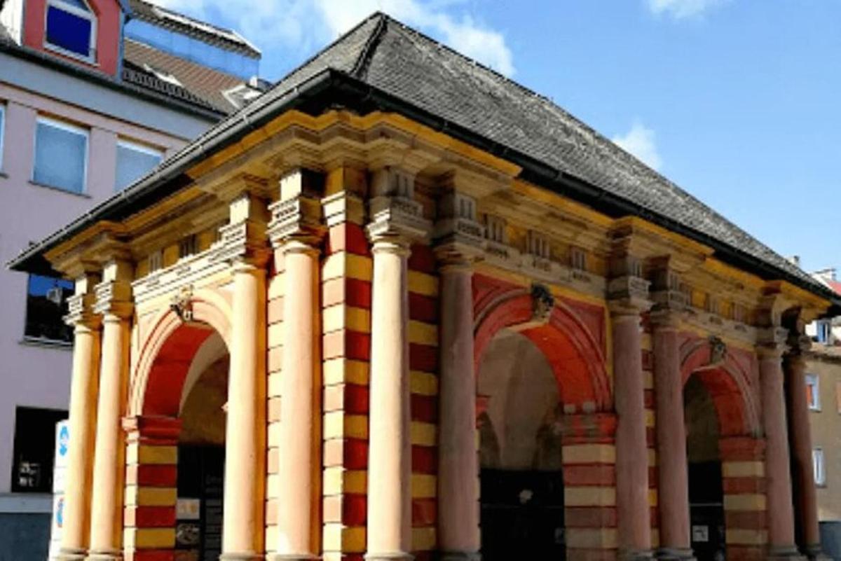 a large building with columns and a roof
