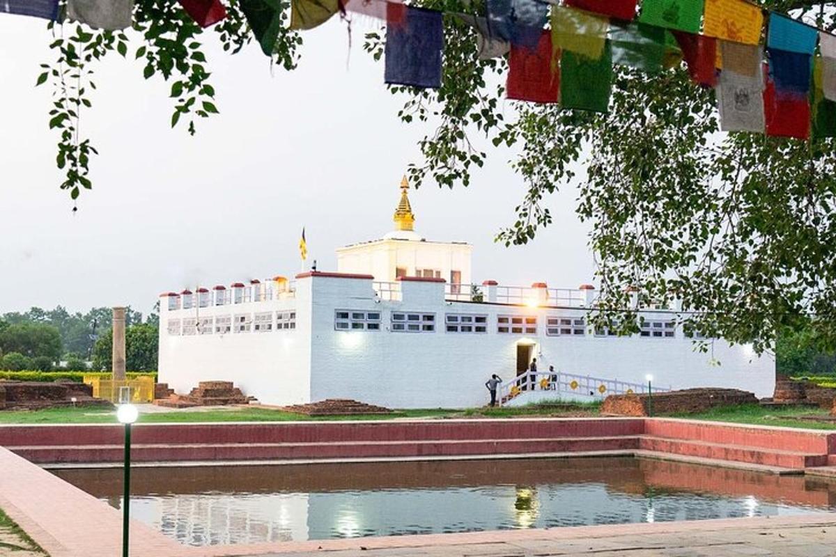 a large white building with a dome on top