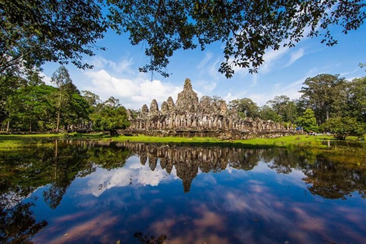 a reflection of a temple in a lake