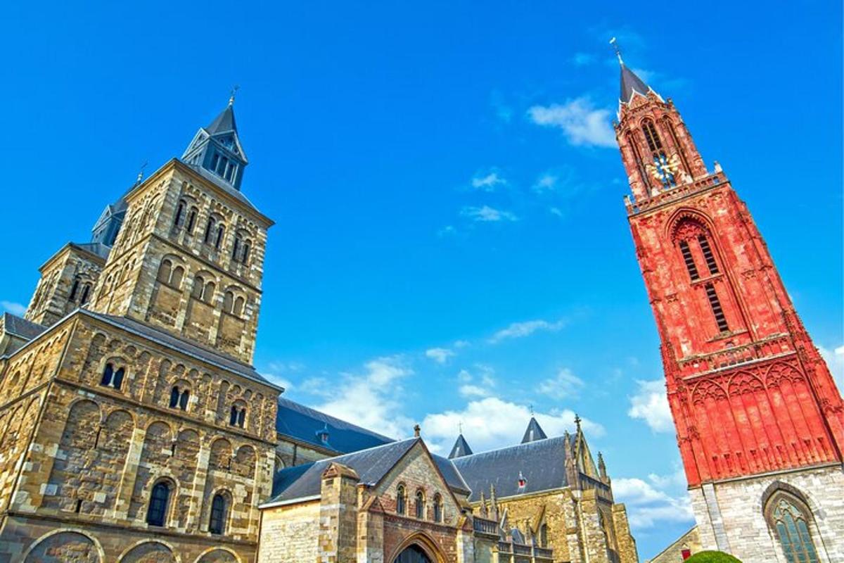 a large building with a clock tower in front of it