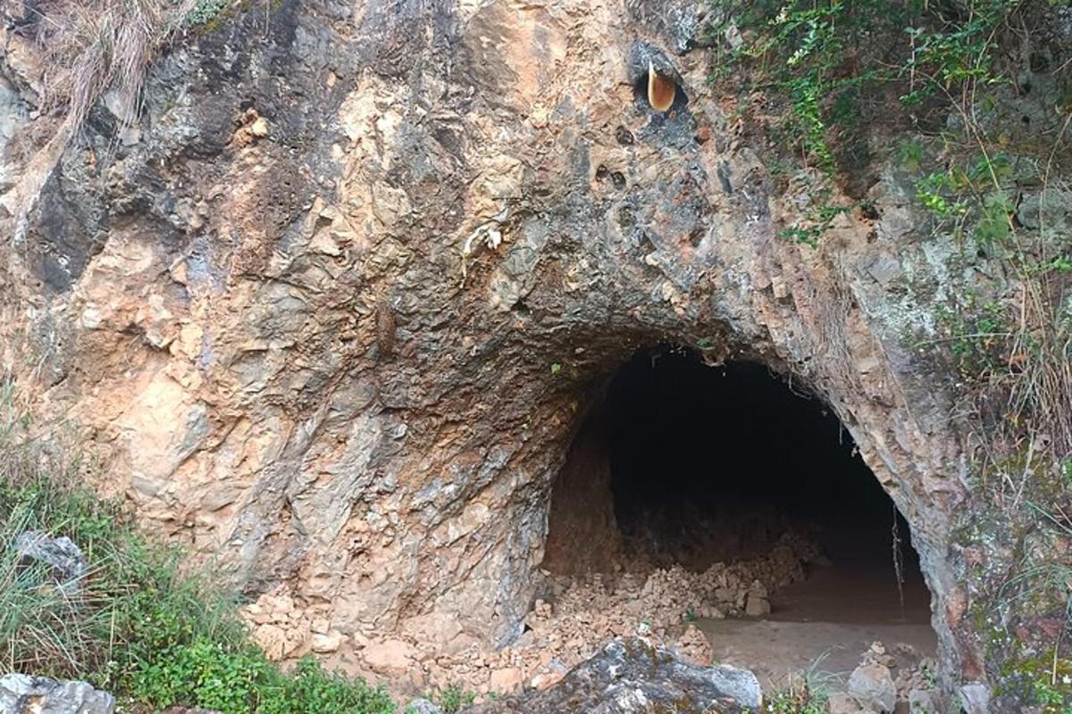 a cave in the side of a cliff