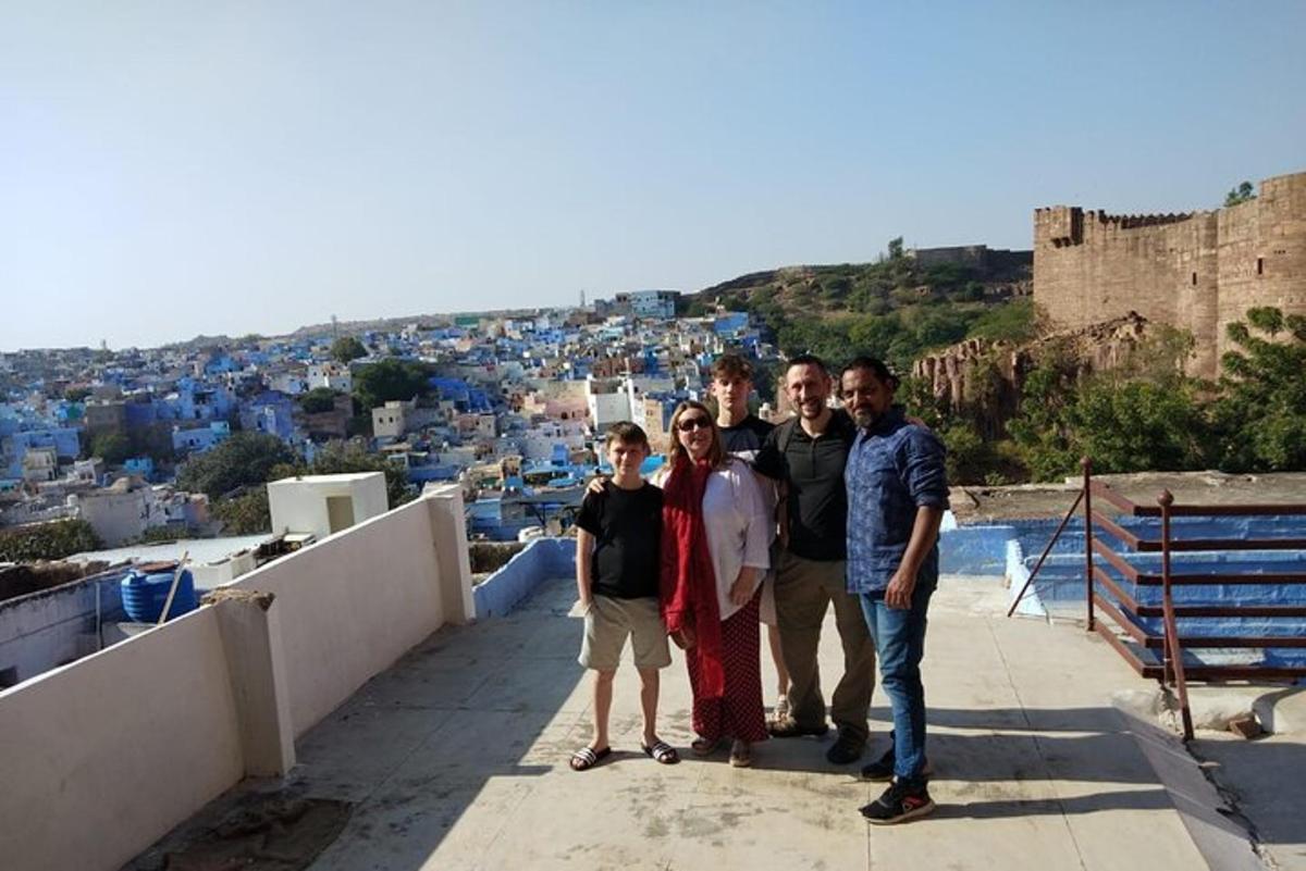 a group of people standing on top of a city