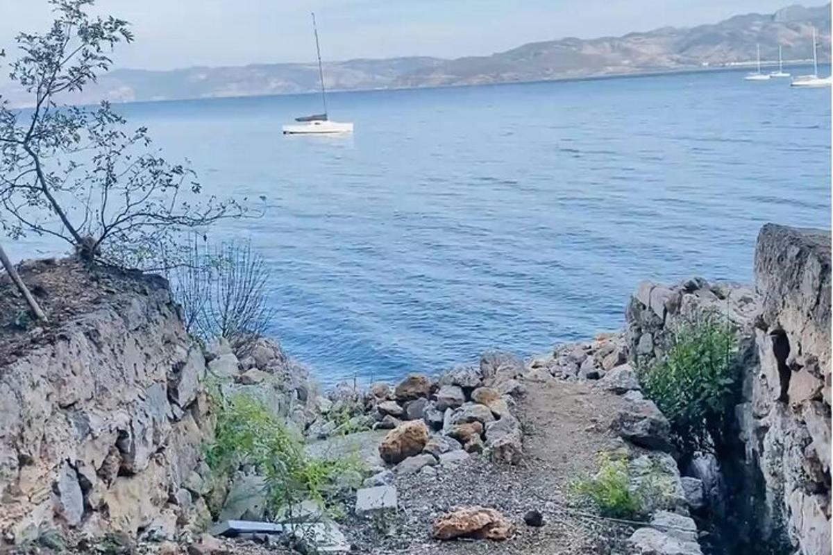 a view of a large body of water with a boat