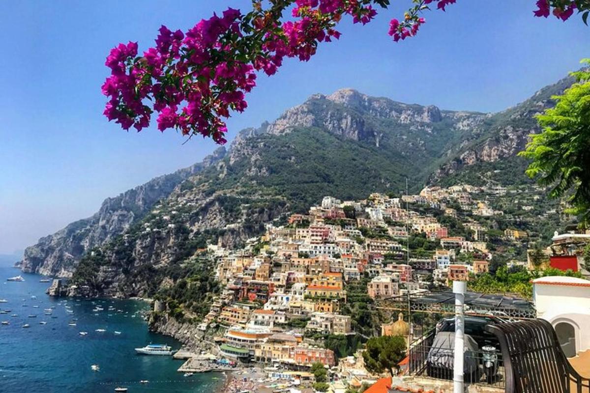 a view of a town on the side of a mountain