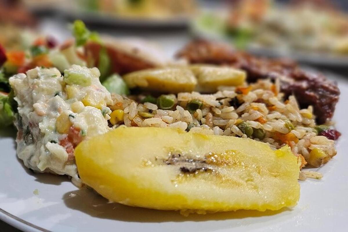 a plate of food with rice and vegetables on it