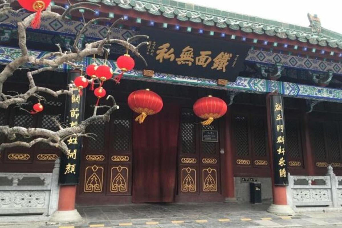 a building with red lanterns in front of it