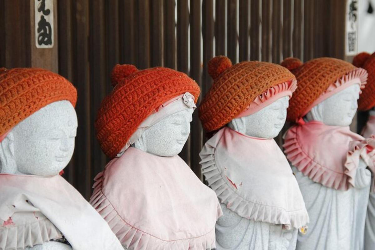 a group of statues wearing hats on their heads