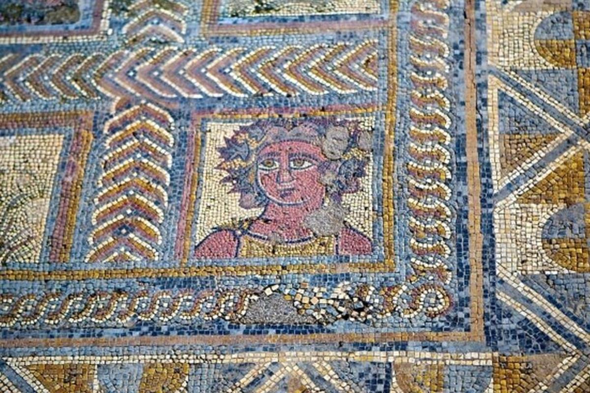 a mosaic floor with a picture of a woman