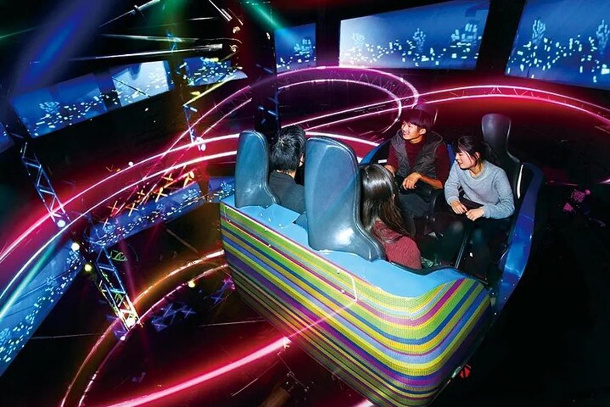 a group of people riding on a roller coaster