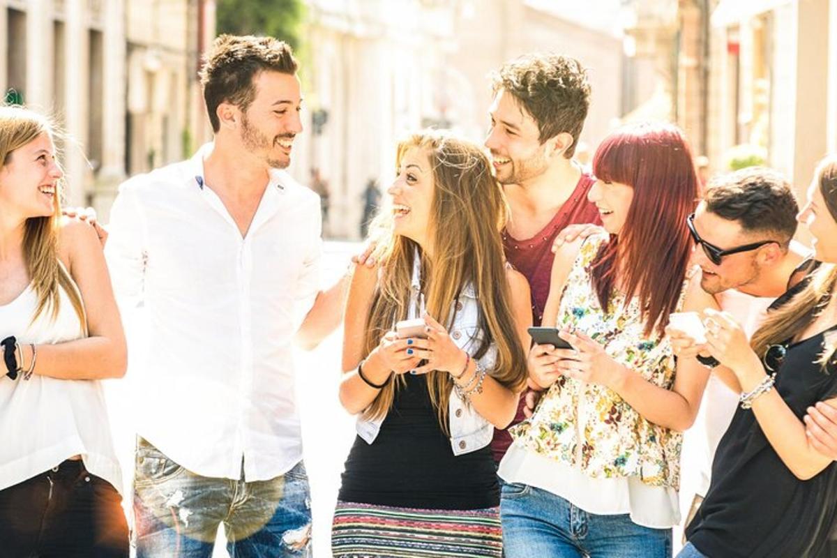 a group of people walking down the street