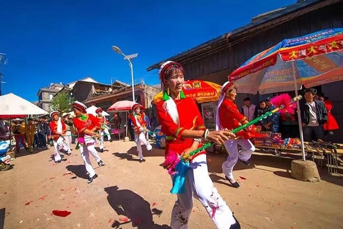 a group of people dancing in a parade