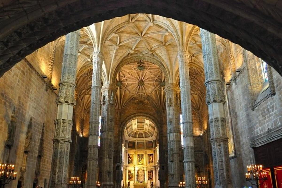 a large room with a large building with columns and ceilings