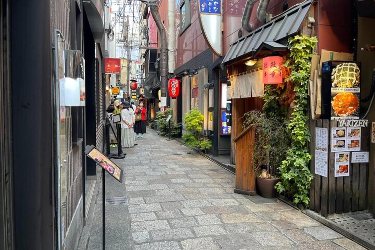 a narrow alley with buildings in an asian city