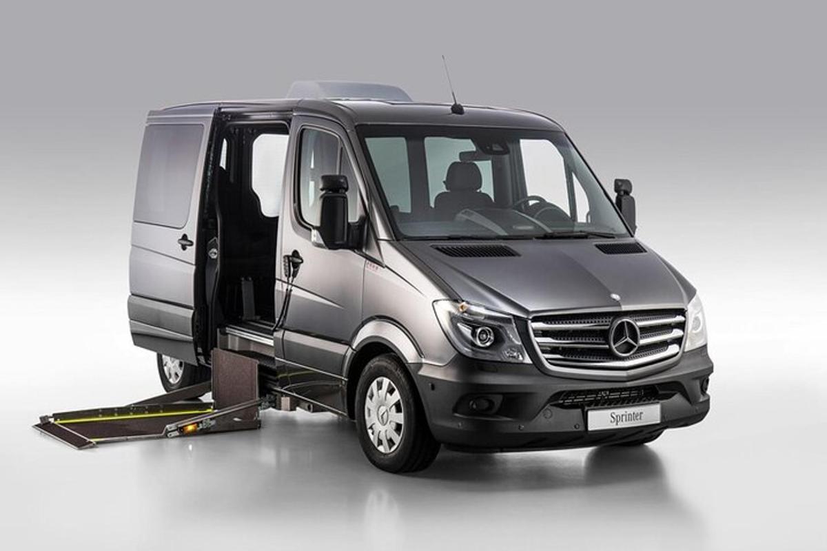 a silver van with its door open on a white background