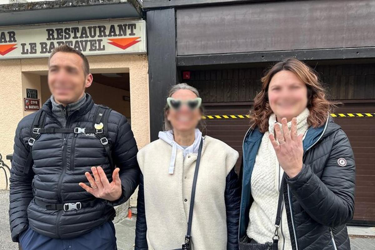 a group of people standing in front of a building