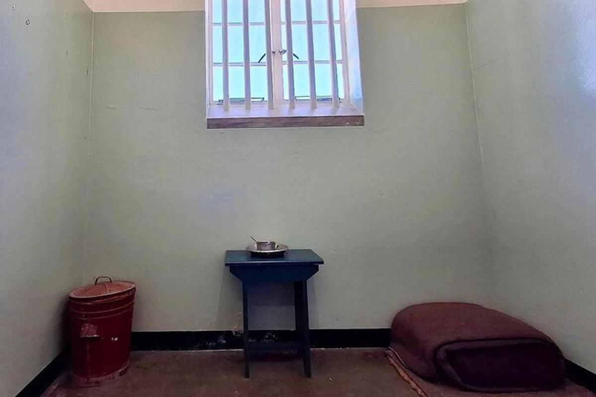 a room with a blue table and a window