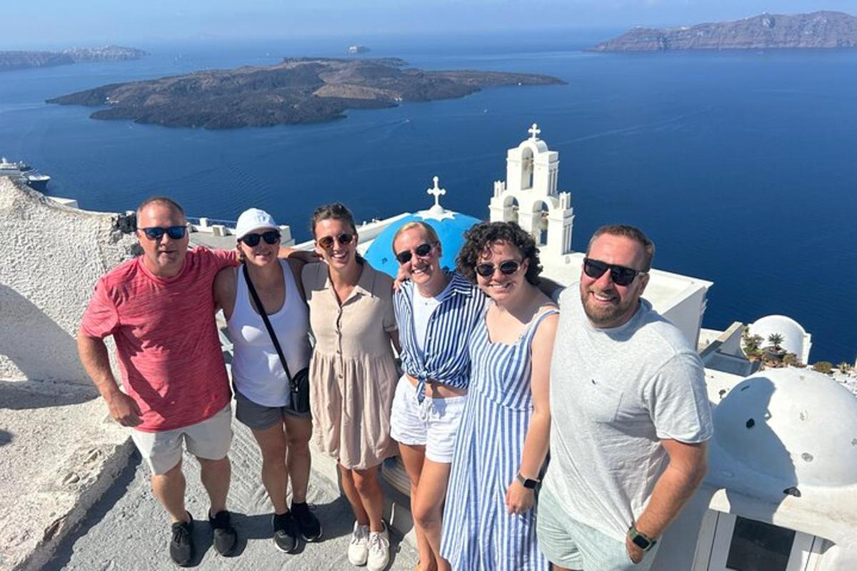a group of people standing on the side of a building