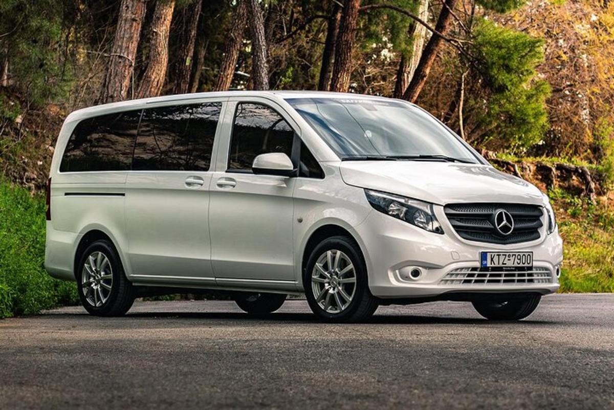 a white van is parked on a road