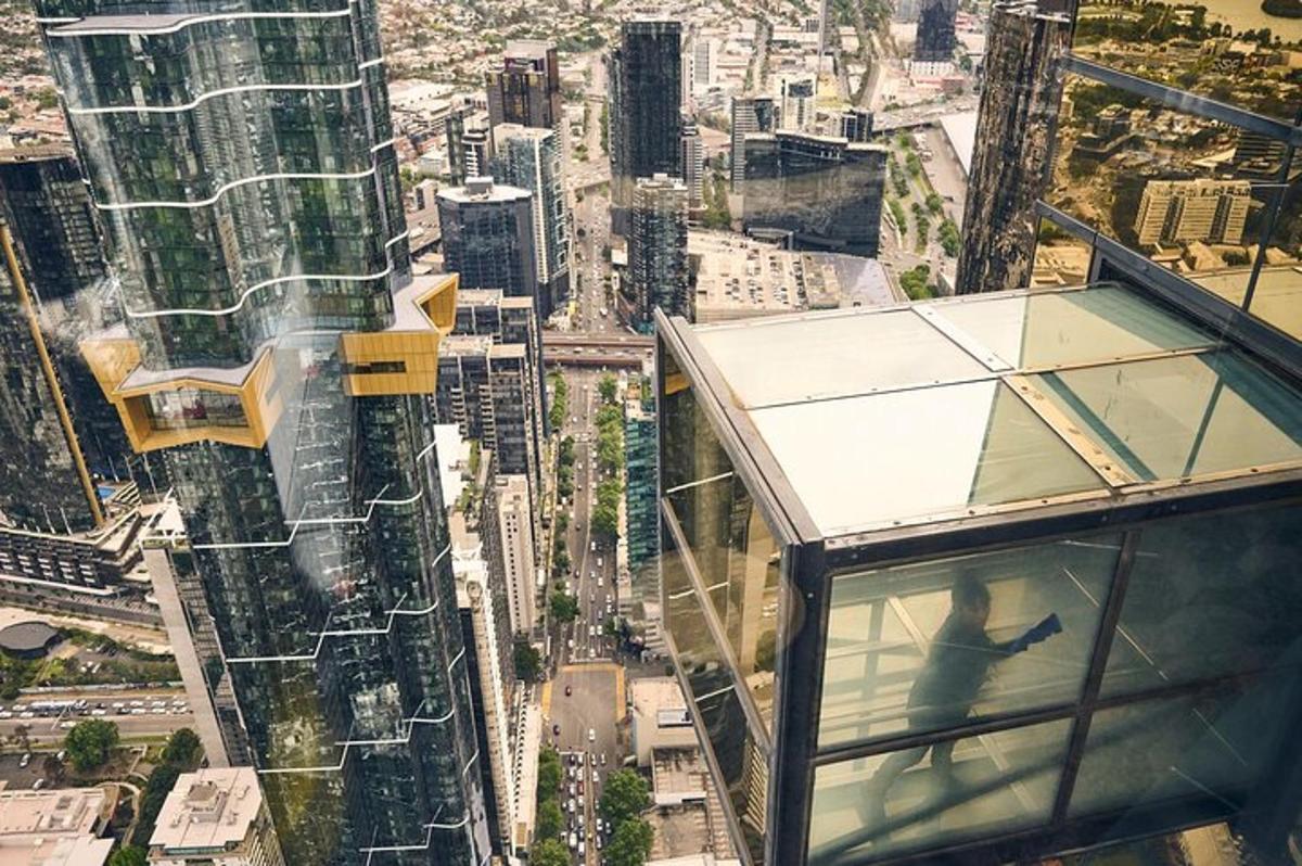 a man standing on the edge of a skyscraper