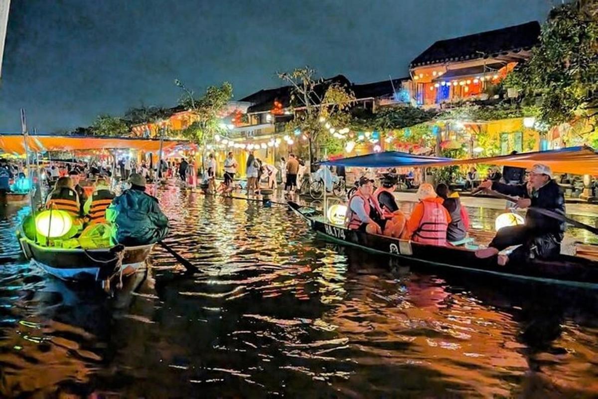 a group of people in boats on a river at night
