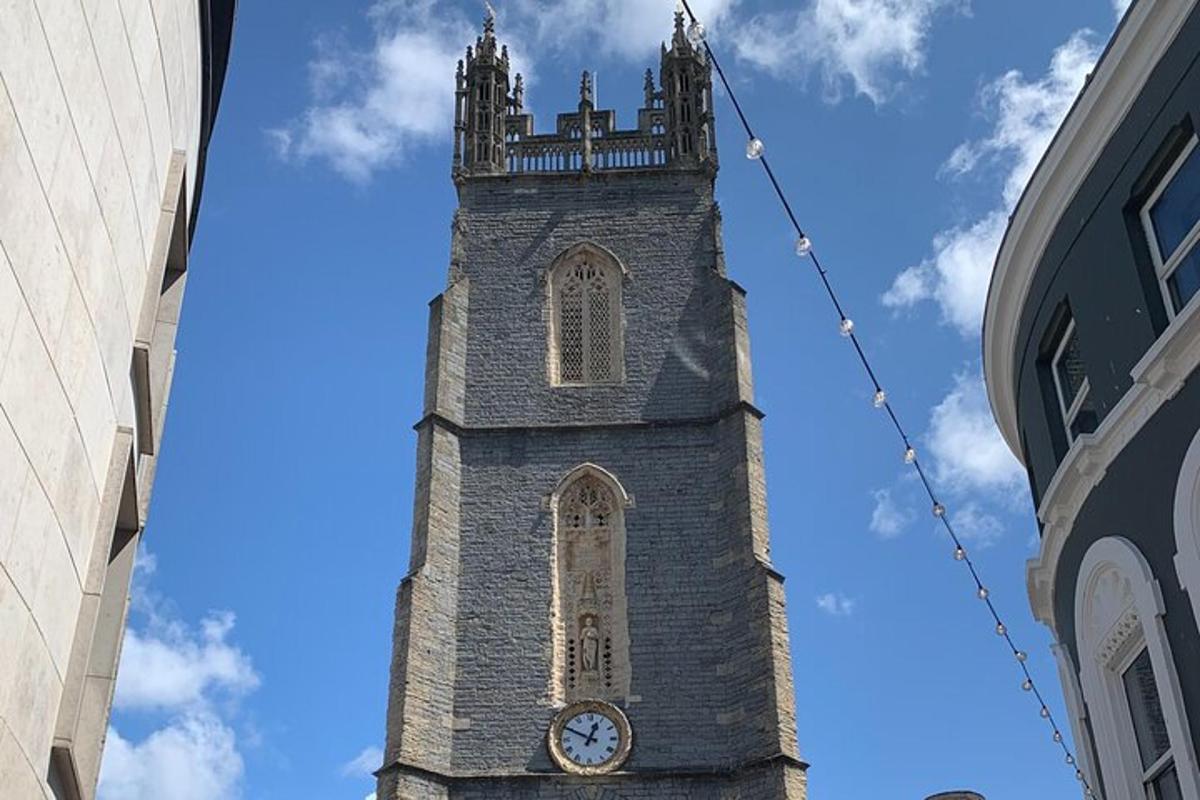 a tall brick tower with a clock on it
