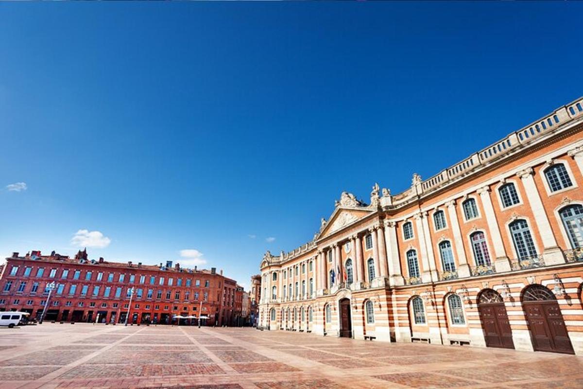 a large building in a city with buildings