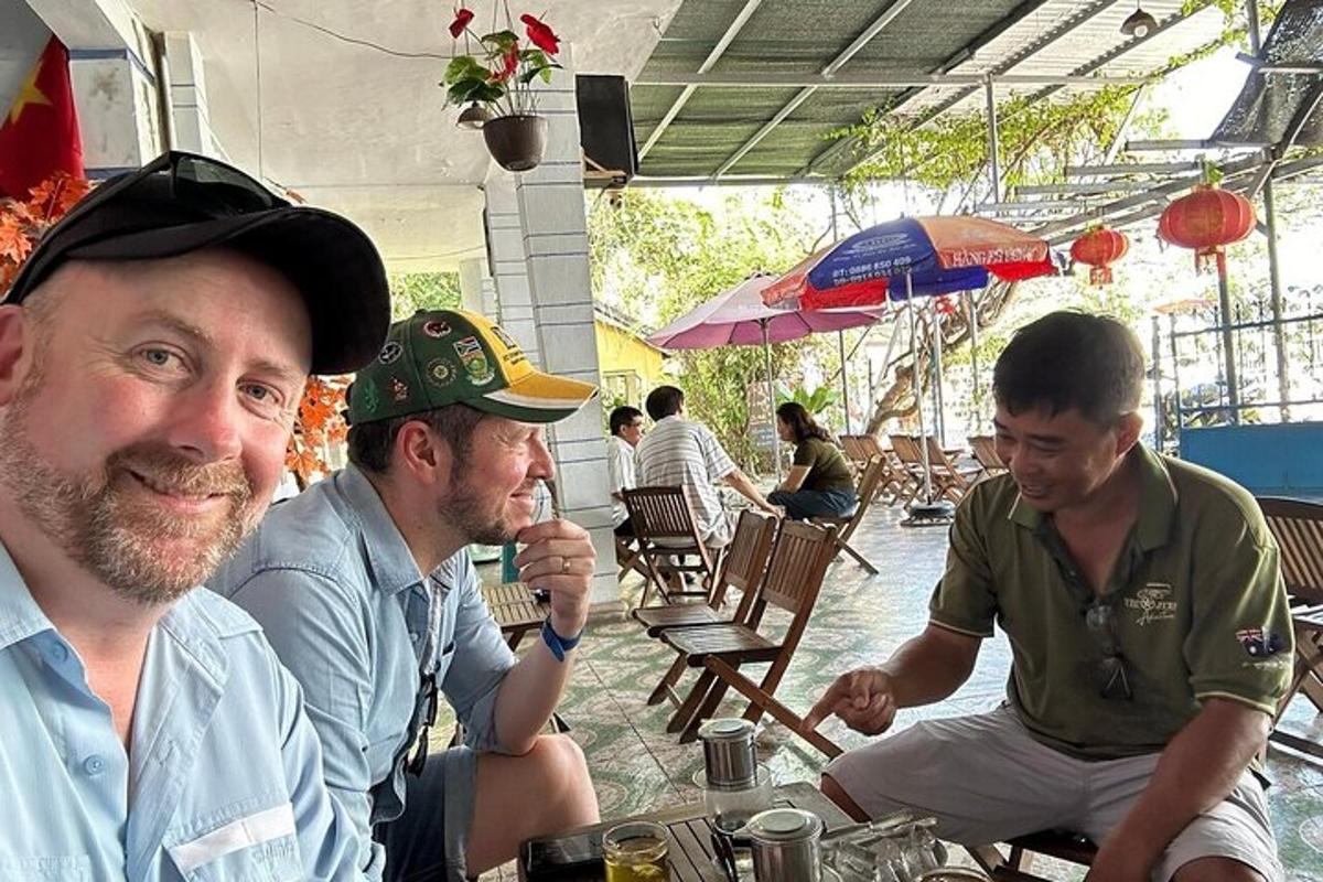 a group of men sitting at a table