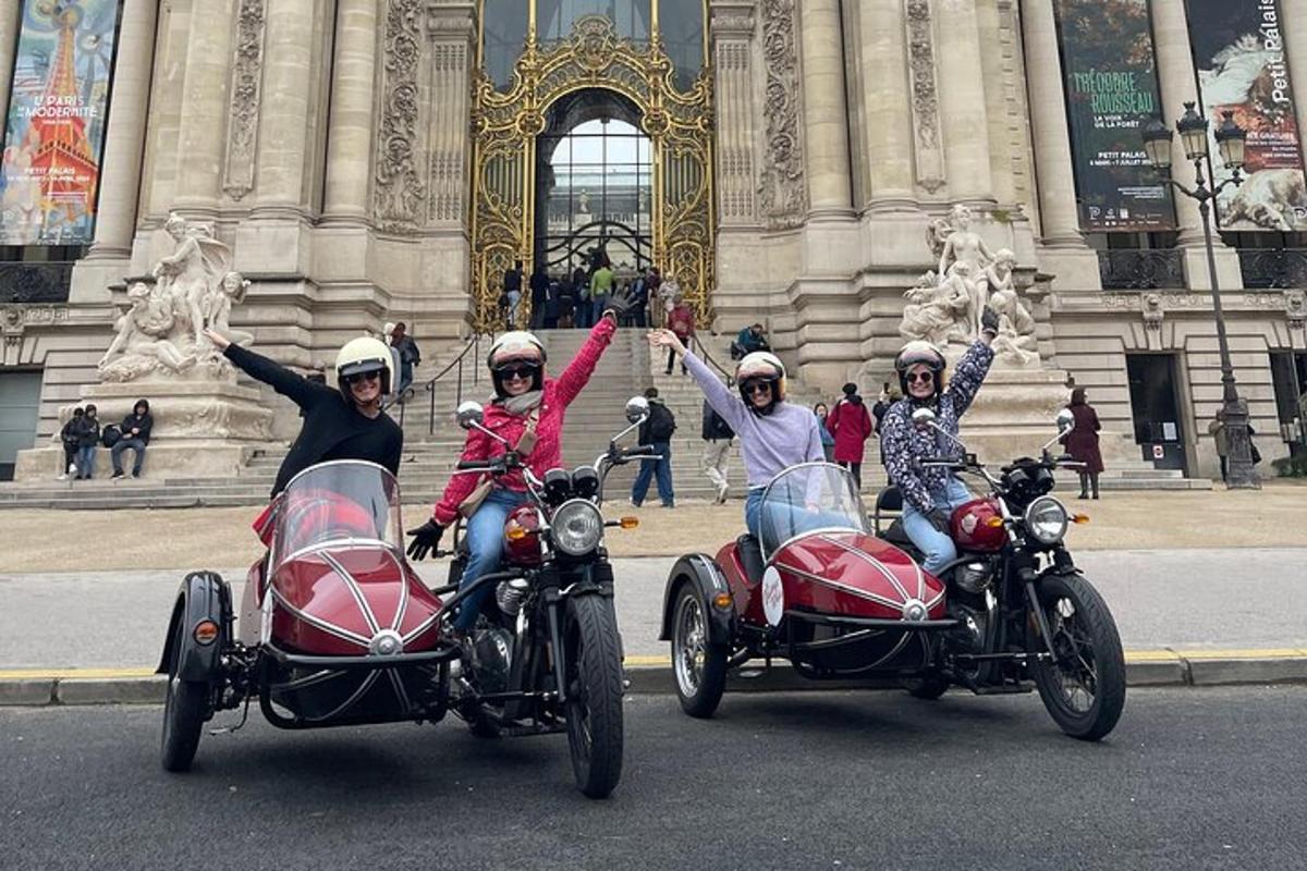 a group of people riding motorcycles down a street