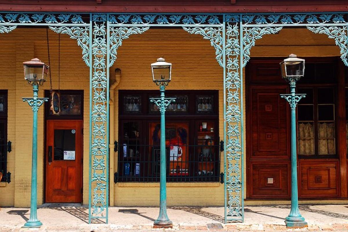 two lights in front of a building with two doors