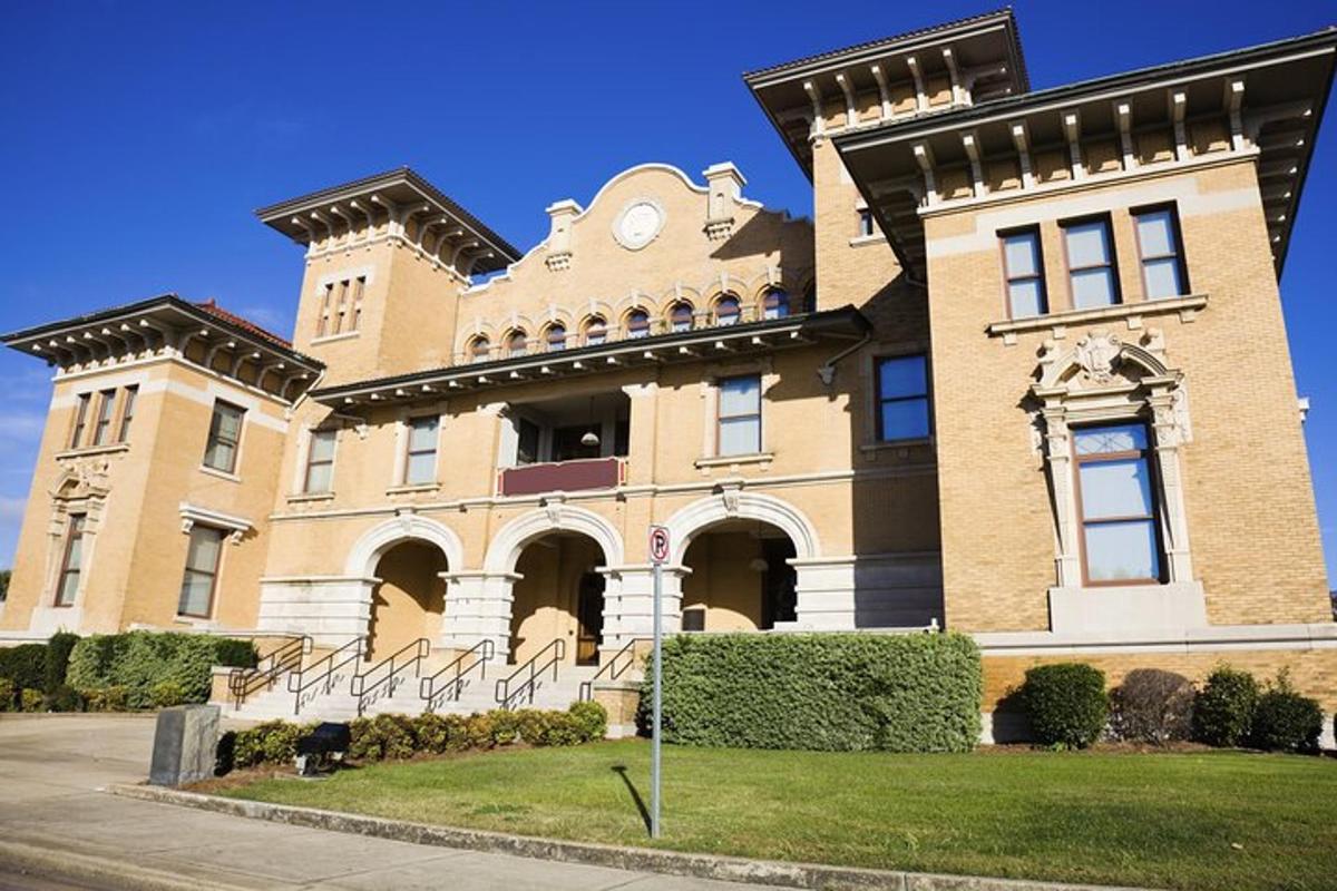 a large brick building with a clock on it