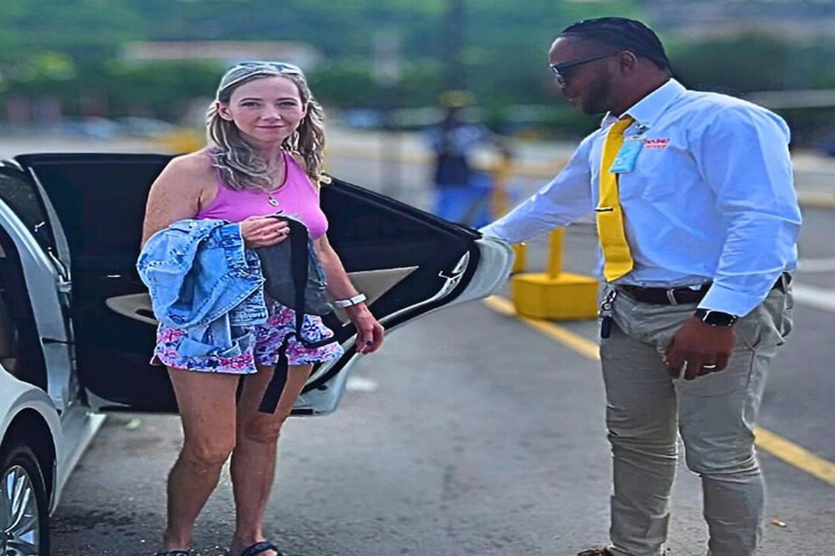 a man loading a woman into a car