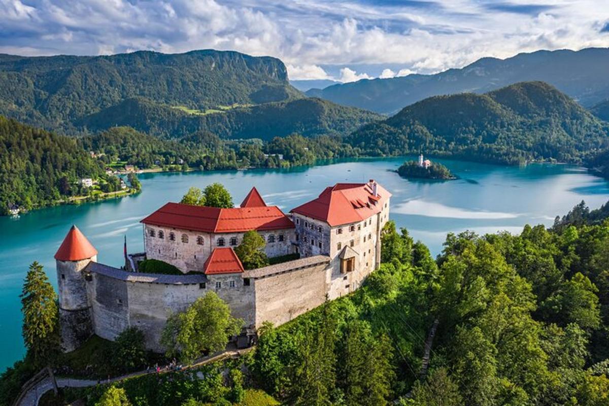 a castle on a island in the middle of a lake