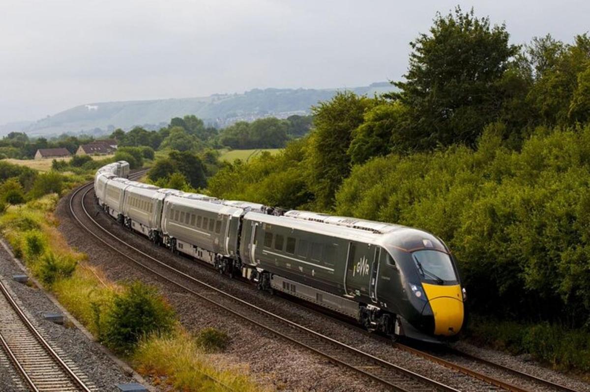 a train is traveling down the tracks