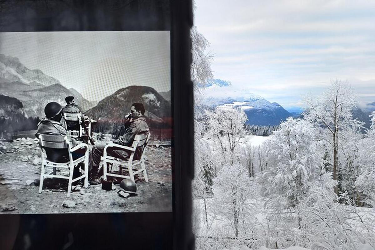 a picture of two people sitting at a table in the snow