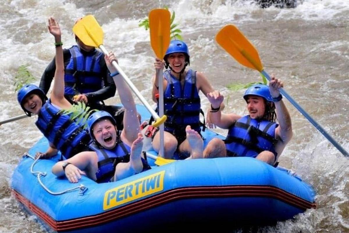 a group of people are rafting on a river