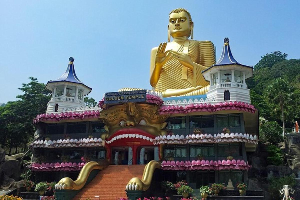 a building with a large golden statue on top of it