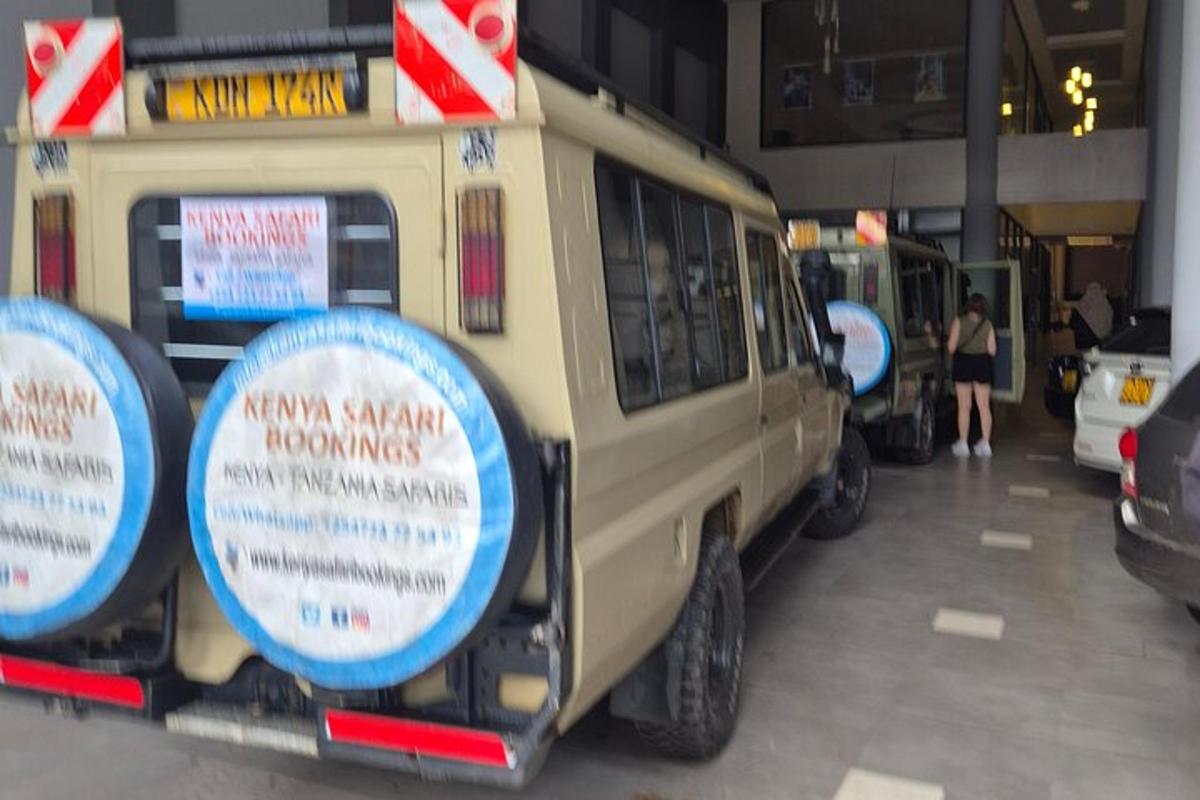 a van parked in a garage with signs on it