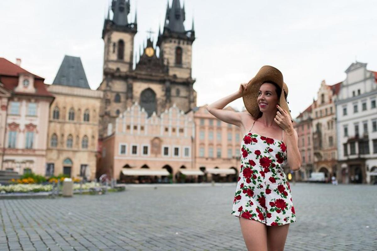 a woman in a dress and a hat on a street