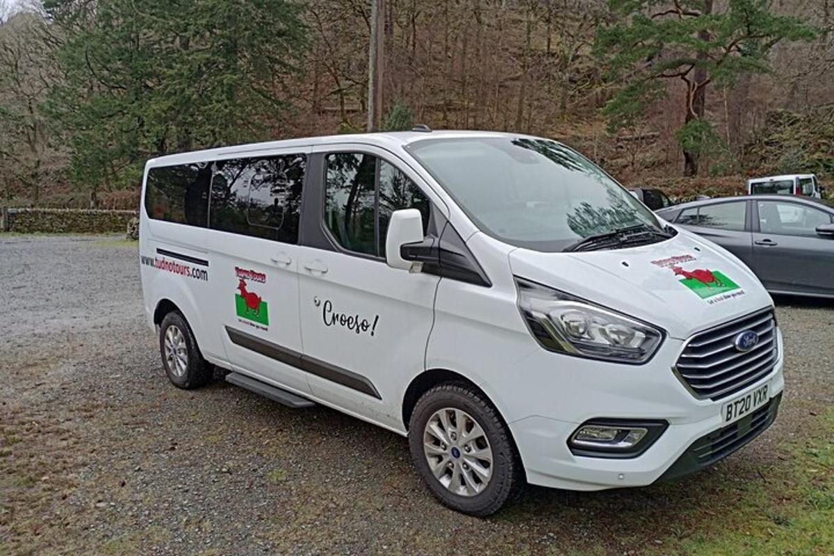 a white van parked in a parking lot