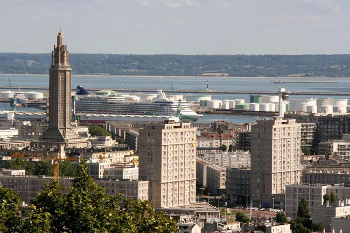 a view of a city with a clock tower and buildings