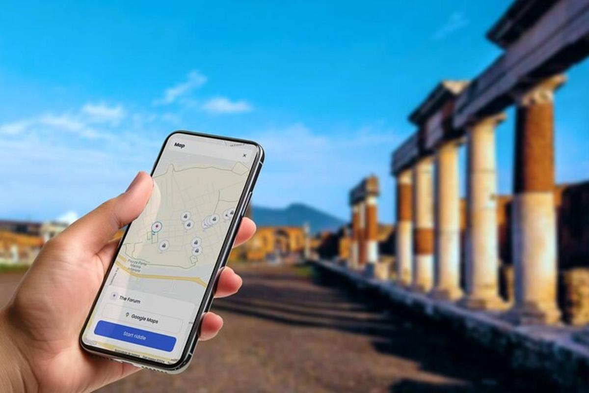 inimene, kes hoiab käes mobiiltelefoni
