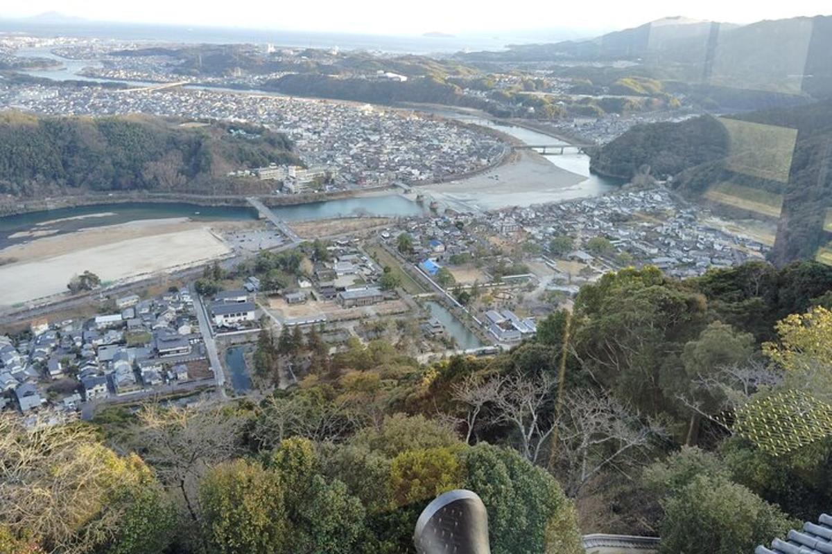 an aerial view of a city and a river