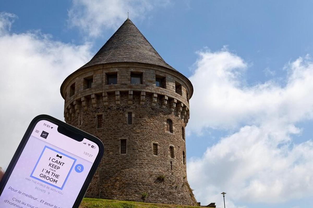 a cell phone in front of a tall tower