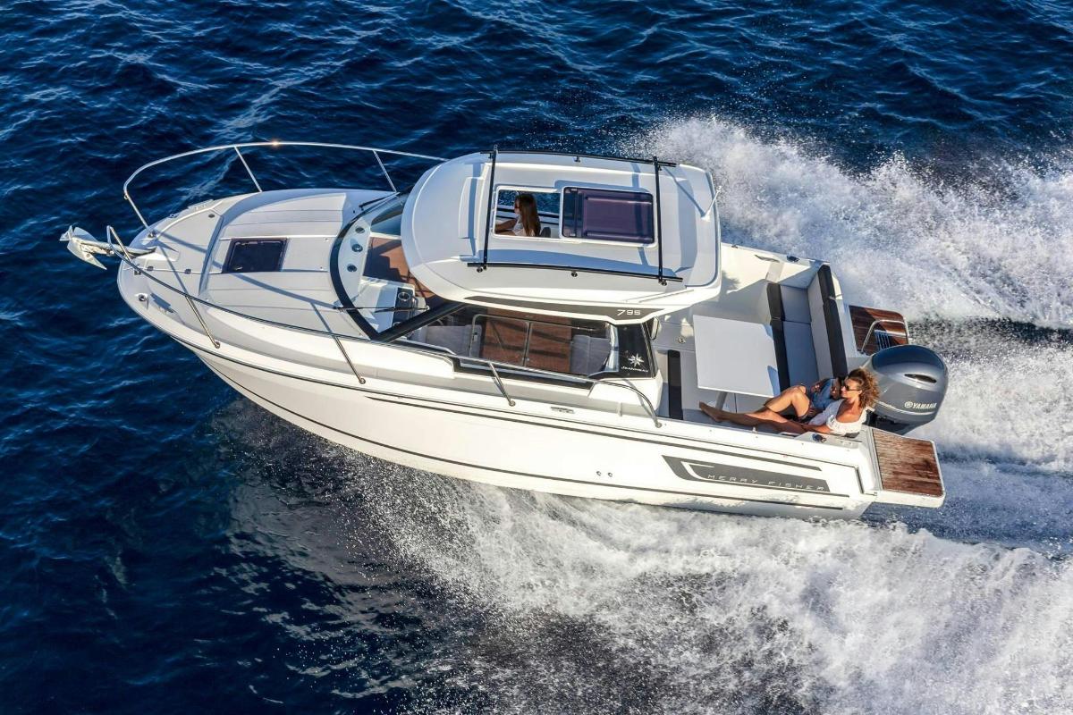 a man and woman on a boat in the water