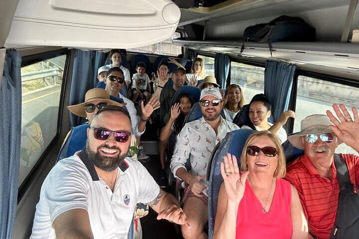 a group of people riding in a bus