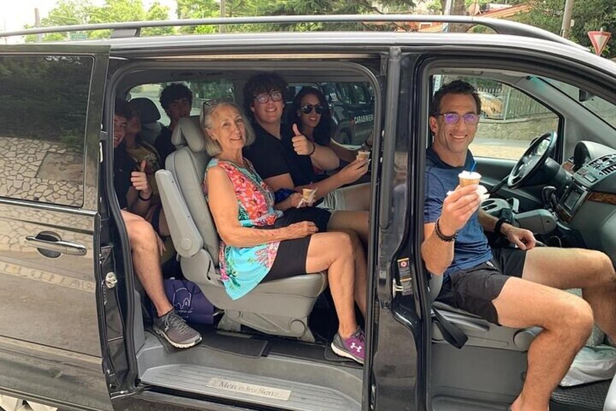 a group of people sitting in the back of a car