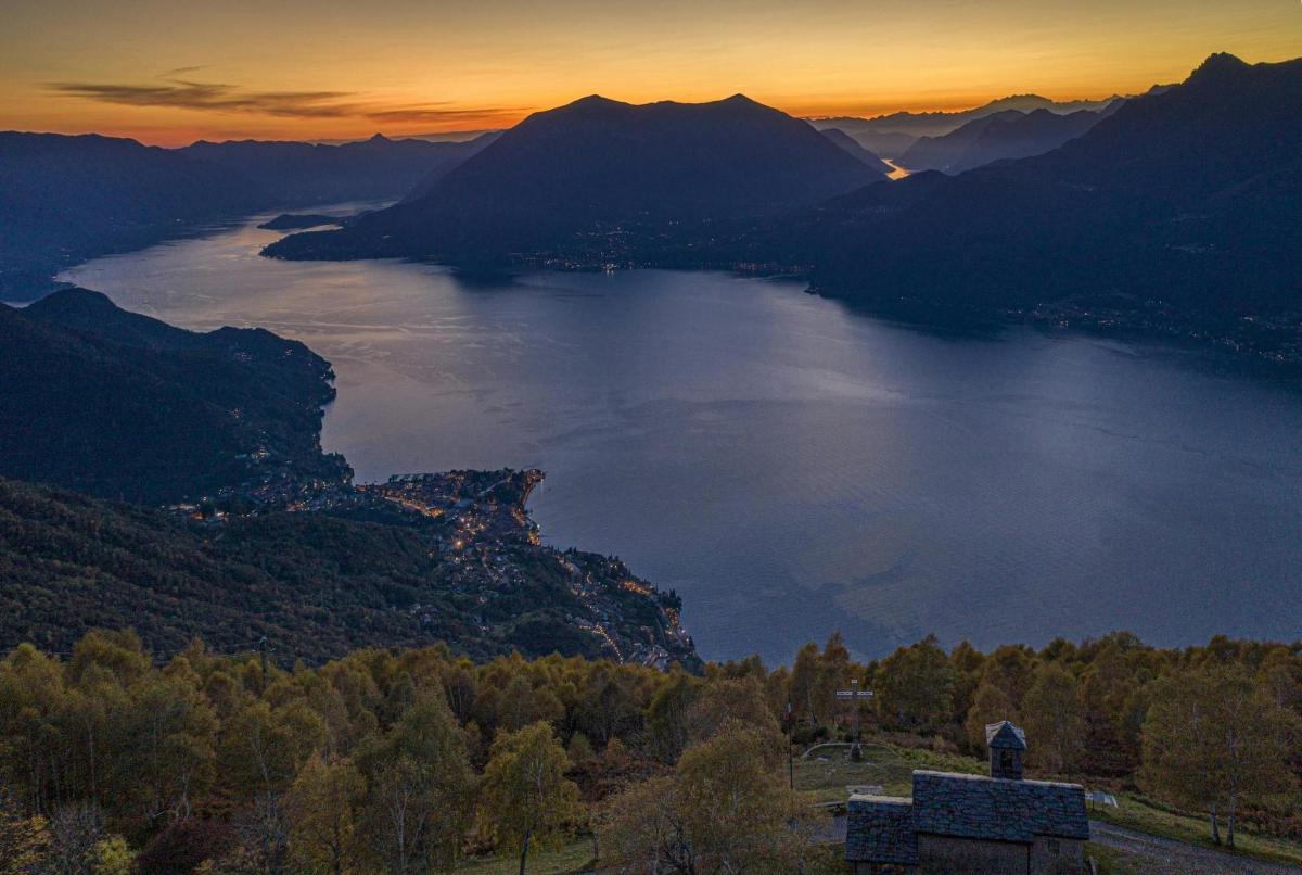 a view of a large body of water at sunset