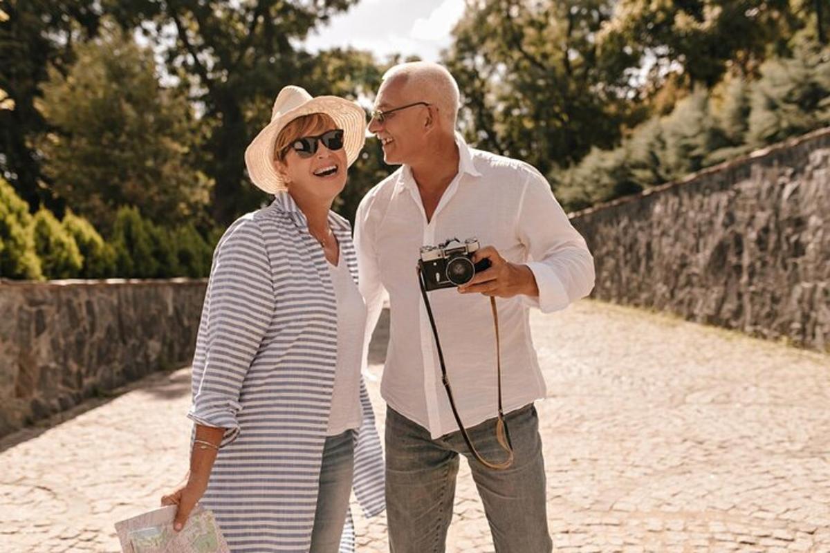 a man and a woman taking a picture with a camera
