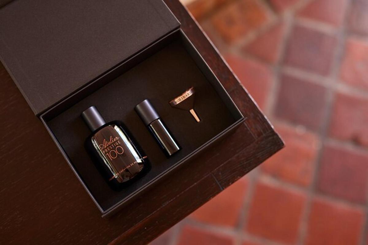 a wooden box with two plugs in it